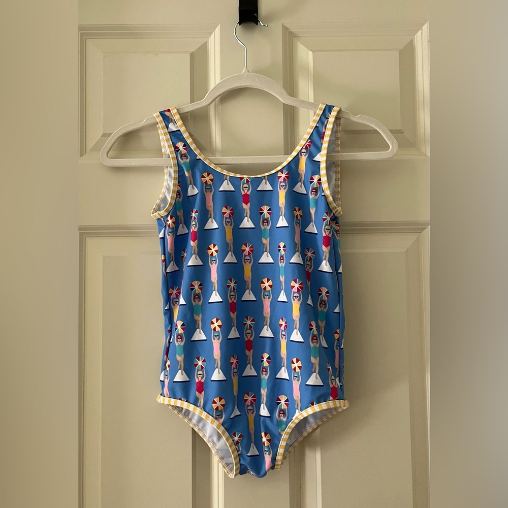 NWT Girl’s Jelly The Pug one piece swimsuit with retro swimmer images, size 8